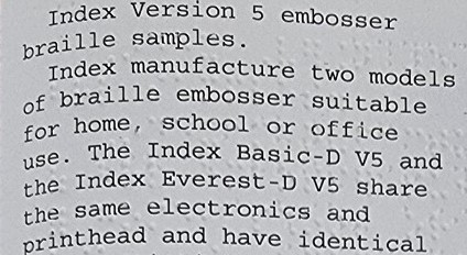 Image of page with text overlaying braille